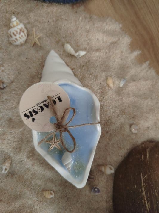 Vela en caracola de mar