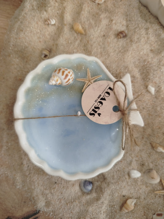 Vela en concha de mar