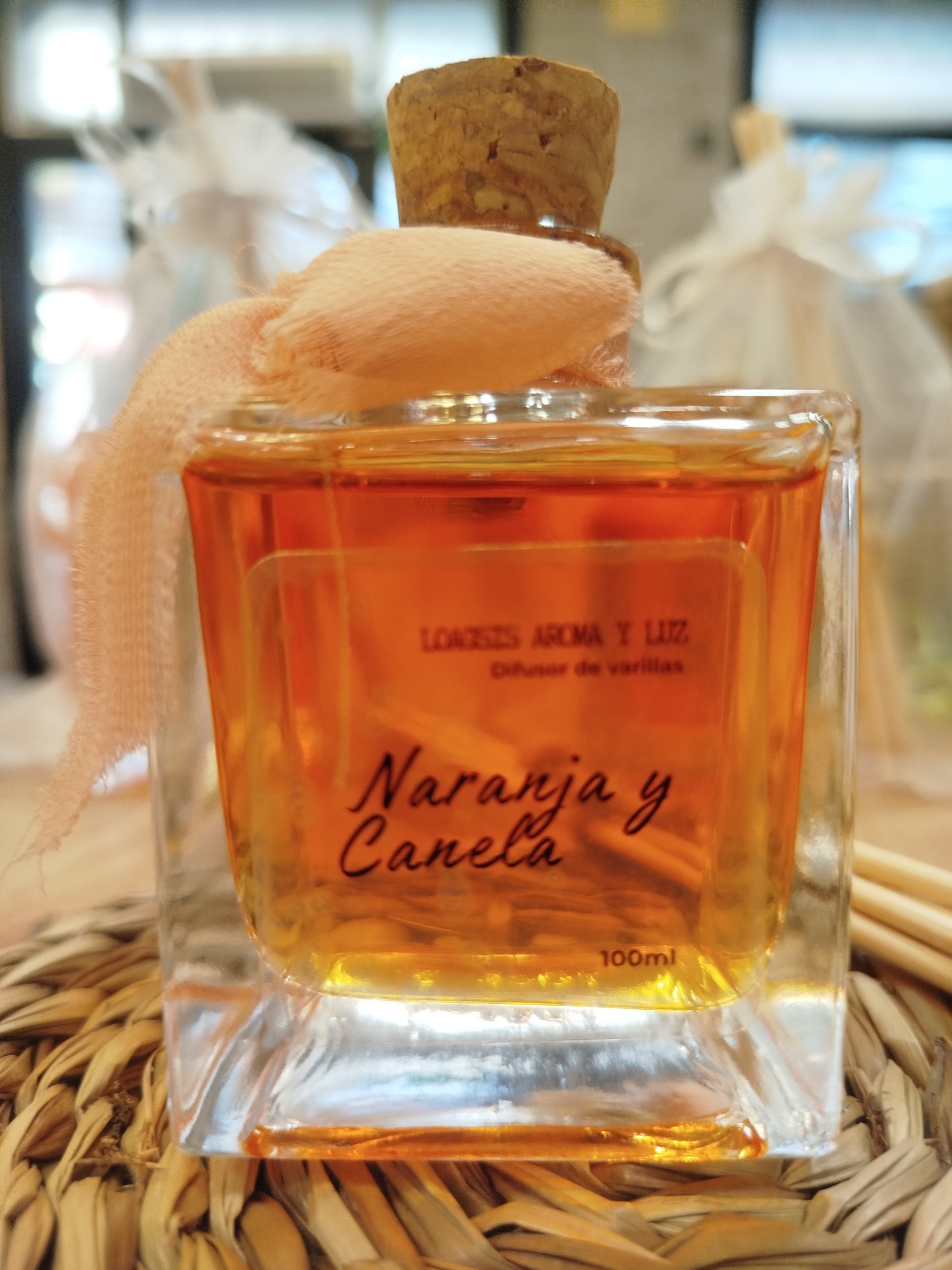 Difusor de varillas canela y naranja